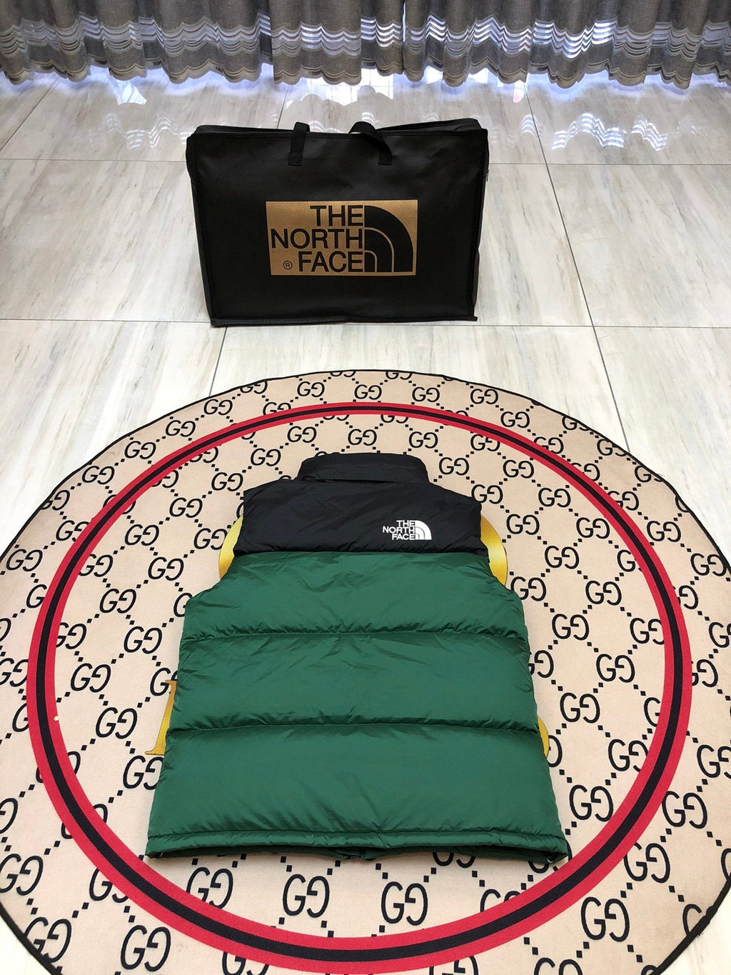 The North Face Puffer Vest in Green and Black with Stand Collar