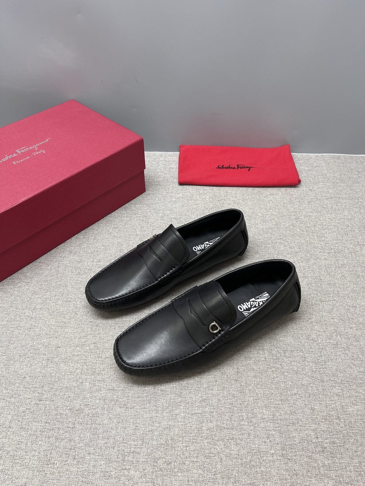 Ferragamo Men's Black Buckle Loafers - Metal Buckle Vamp Detail